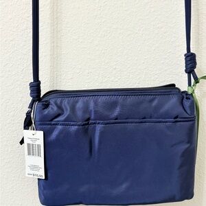 Vera Bradley Navy Crossbody Bag. Has a shimmery, iridescent look to the material